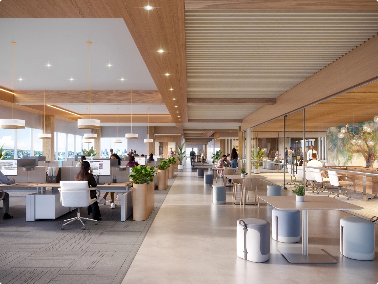Contemporary open office floor plan with shared desks and indoor plants