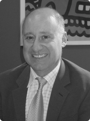 Corporate portrait featuring male executive in formal business attire